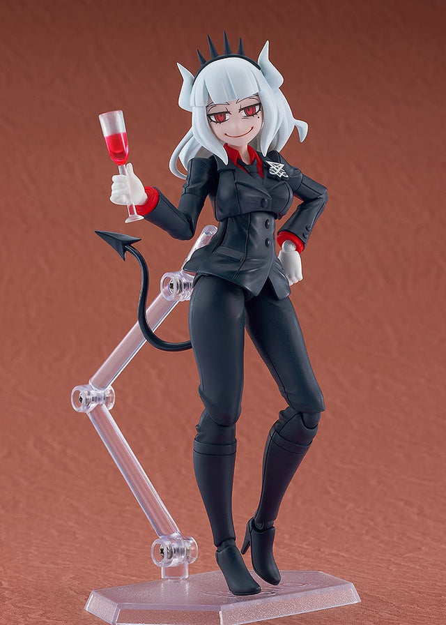 figma Lucifer standing on her display stand holding a glass of red wine