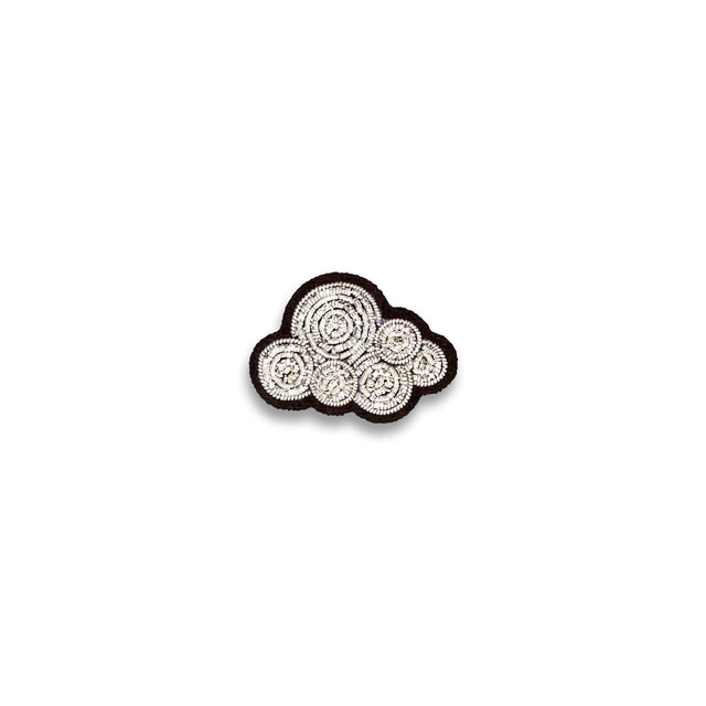 Macon & Lesquoy cumulus cloud lapel pin hand-embroidered in coiled silver thread, photographed on a plain white background