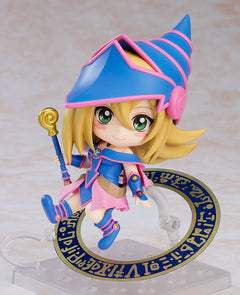 Nendoroid Dark Magician Girl posed in flight holding her golden staff