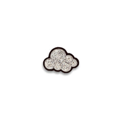 Macon & Lesquoy cumulus cloud lapel pin hand-embroidered in coiled silver thread, photographed on a plain white background