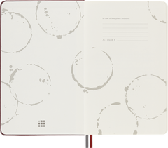 Wine-ring patterned endpapers of the Moleskine Wine Passion Journal with the In case of loss panel