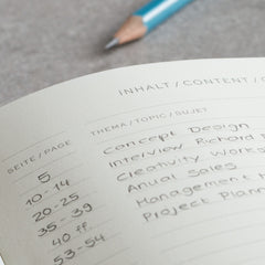 Close-up of the blank table of contents page inside a LEUCHTTURM1917 notebook, filled in by hand in pencil