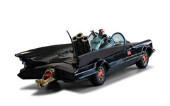 Nearside profile of the black 1966 Batmobile die-cast model showing the red trim and bubble canopies
